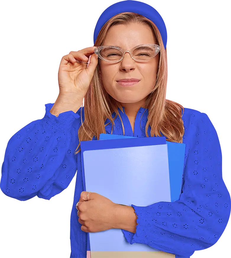 Student adjusting her glasses and holding folders